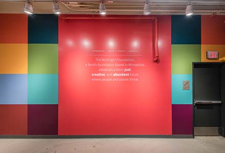 Painted wall with mission statement in lobby of McKnight Foundation