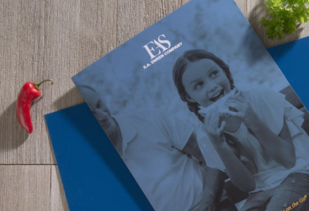 Cover of a pocket folder for E.A. Sween with a pepper and parsley