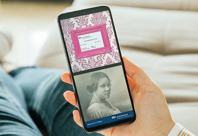 Person holding a phone looking at social media posts about framing cosmetology licenses and Black History Month