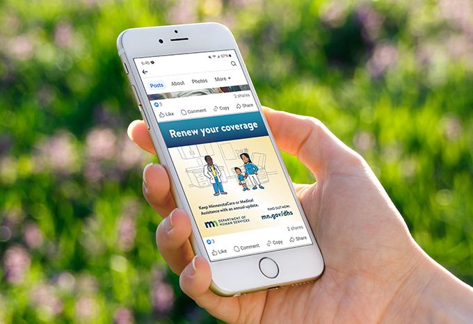 Mobile device with an ad for the Minnesota Department of Human Services Healthcare Renewal Campaign