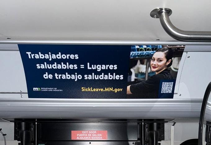 Bus board in Spanish for the Minnesota Department of Labor Earned Sick and Safe Time Campaign