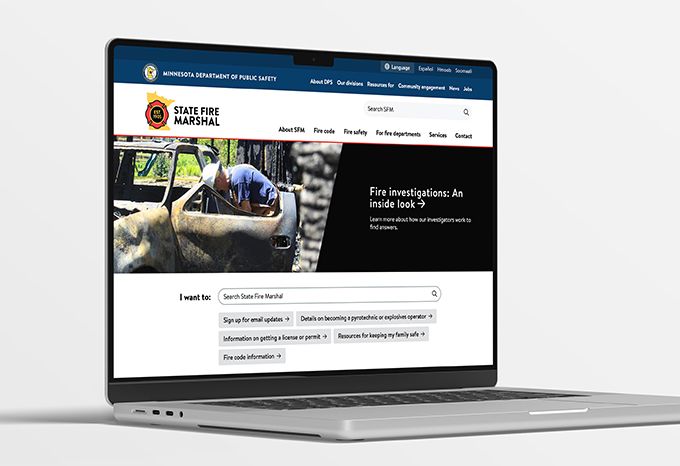 Laptop with home page for Minnesota State Fire Marshal