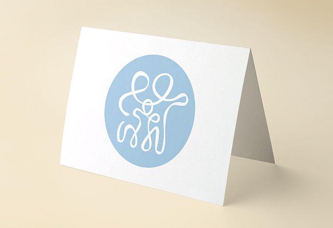 Notecard for Rauk Dentistry with the logo on the cover